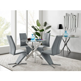 Furniturebox Novara Clear Tempered Glass 100cm Round Dining Table with Chrome Starburst Legs & 4 Grey Willow Faux Leather Chairs