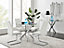Furniturebox Novara Clear Tempered Glass 100cm Round Dining Table with Chrome Starburst Legs & 4 White Lorenzo Faux Leather Chairs