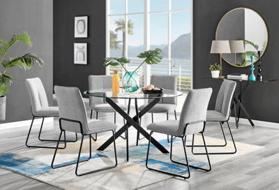 Furniturebox Novara Clear Tempered Glass 120cm Round Dining Table with Black Starburst Legs & 6 Cream Halle Soft Fabric Chairs