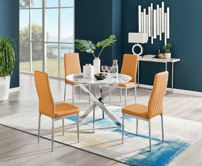 Furniturebox Novara White Marble Effect 100cm Round Dining Table with Chrome Starburst Legs & 4 Mustard Faux Leather Milan Chairs