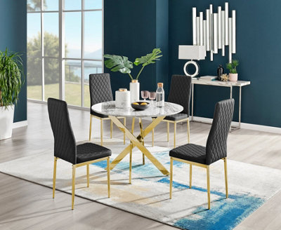 Furniturebox Novara White Marble Effect 100cm Round Dining Table with Gold Starburst Legs & 4 Black Milan Faux Leather Chairs