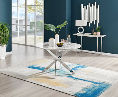 Furniturebox Novara White Marble Effect 120cm Round Dining Table with Chrome Starburst Legs & 6 White Faux Leather Milan Chairs