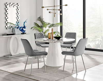 White marble table with shop chairs