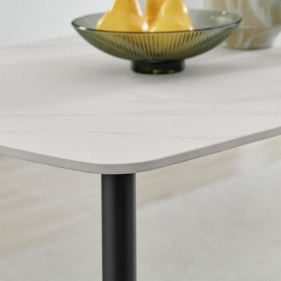 Furniturebox UK Asti Rectangular White Marble Effect Dining Table - Matte Finish, Tapered Black Metal Legs, Seats 4