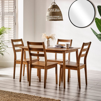 https://media.diy.com/is/image/KingfisherDigital/furniturebox-uk-lynton-small-walnut-colour-wooden-dining-table-4-dining-chairs~5060661186203_01c_MP?$MOB_PREV$&$width=618&$height=618