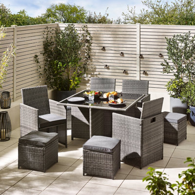 Furniturebox UK Monaco Grey PE Rattan Outdoor Garden 8 Seater Dining Table and Chairs Set with Dark Grey Cushions - Free Cover