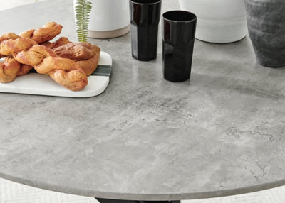 Furniturebox UK Novara Grey Concrete Effect Black Leg Round Dining Table & 4 Green Velvet Milan Black Leg Chairs