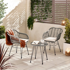 FurnitureboxUK Belize Grey Rattan Outdoor Set - Round Garden Coffee Table + 2 Rattan Garden Chairs with Cream Cushions