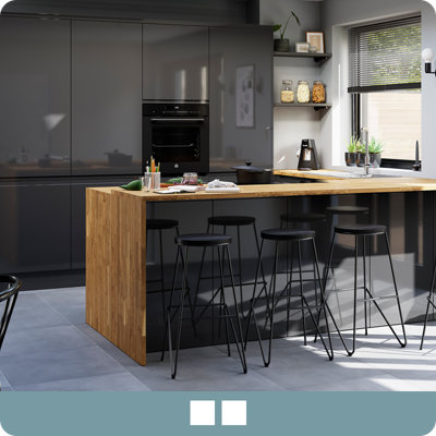 View Garcinia in the colour Anthracite, an earthy, which features cabinets in a dark shade of grey with a glossy finish.