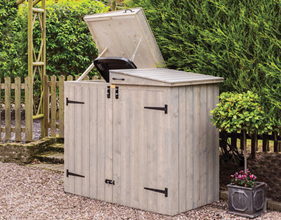 A bin store with two large doors on the front, and two hatches on the top which allow you to place items in the bin without removing them from the store.
