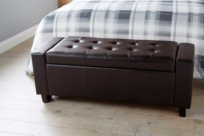 Black and store brown ottoman