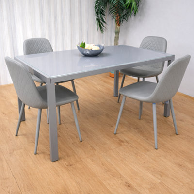 Glass Dining table and 4 grey leather chairs Grey Glass Table And 4 ...