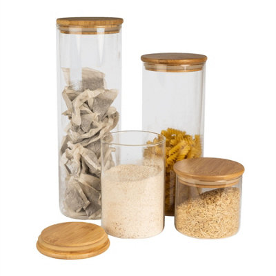 https://media.diy.com/is/image/KingfisherDigital/glass-storage-jars-with-bamboo-lids-set-of-4-m-w~5055884523713_01c_MP?$MOB_PREV$&$width=618&$height=618