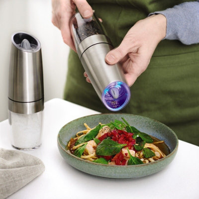 https://media.diy.com/is/image/KingfisherDigital/gravity-salt-pepper-mill-set-with-led-light-battery-operated-stainless-steel-grinding-kitchen-tool-each-h20-x-5cm-diameter~5053335895587_01c_MP?$MOB_PREV$&$width=768&$height=768