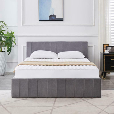 Grey fabric store bed with drawers