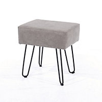 grey fabric upholstered rectangular stool with black metal legs