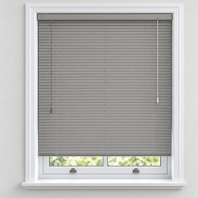 Grey PVC blinds above a kitchen sink.
