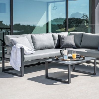 Havana Corner Group Set with Reclining Feature and Coffee Table in Washed Grey