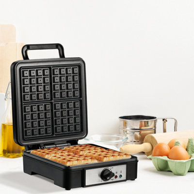 https://media.diy.com/is/image/KingfisherDigital/homcom-4-slice-waffle-maker-w-deep-cooking-plate-adjustable-temperature1200w~5056534572549_01c_MP?$MOB_PREV$&$width=618&$height=618