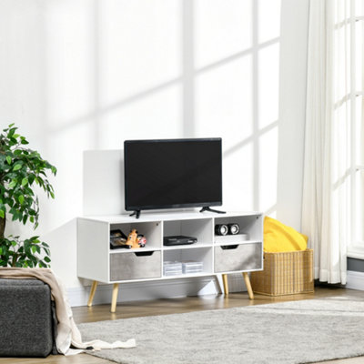 Entertainment center with store drawers and shelves