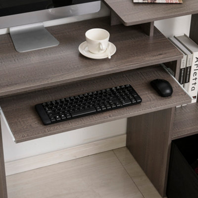 Desk with store sliding tray