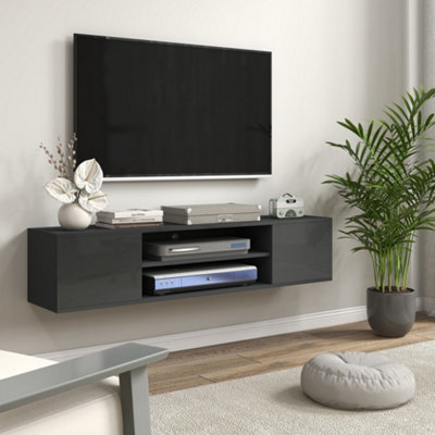 Wall tv cabinet with deals doors that enclose tv