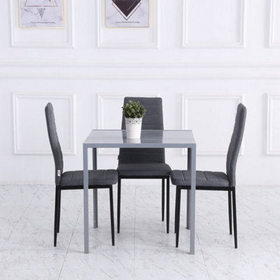 HOMCOM Modern Square Dining Table with Tempered Glass Top Metal Legs for Kitchen