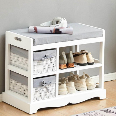 White entryway bench with store shoe storage