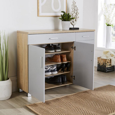 Grey shoe outlet storage cupboard