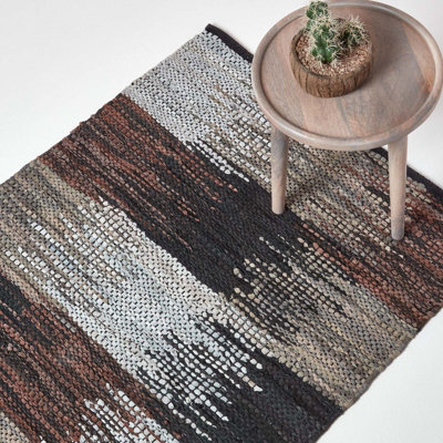 Homescapes Black, Grey & Brown Real Leather Handwoven Cutshuttle Rug, 66 x200 cm