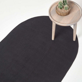 Homescapes Black Handmade Woven Braided Oval Rug, 110 x 170 cm