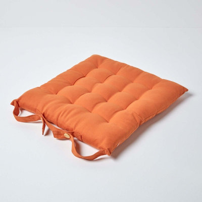 Homescapes Burnt Orange Plain Seat Pad with Button Straps 100% Cotton 40 x 40 cm