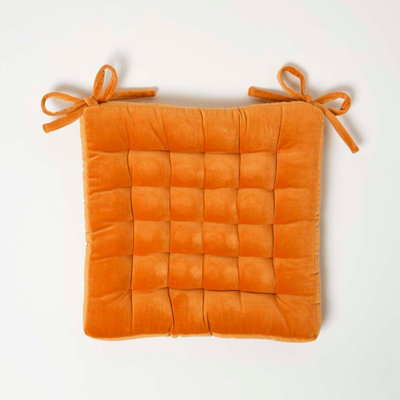 Homescapes Burnt Orange Quilted Velvet Chair Pad 40 x 40 cm DIY at B Q