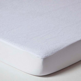 Homescapes Cot Bed Terry Towelling Waterproof Mattress Protector 60 x 120 cm, Pack of 2