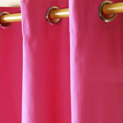 Homescapes Cotton Plain Hot Pink Ready Made Eyelet Curtain Pair