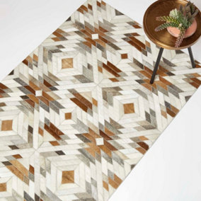 Homescapes Cream & Brown  Geometric Leather Rug, 90 x 150 cm
