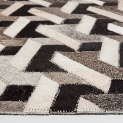 Homescapes Grey & Black Geometric Leather Rug, 90 x 150 cm