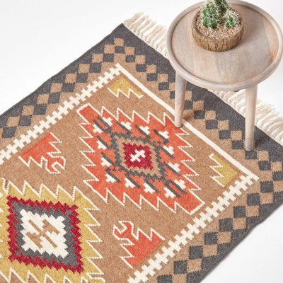 Homescapes Jaipur Handwoven Brown and Orange Patterned Kilim Wool Rug, 120 x 170 cm