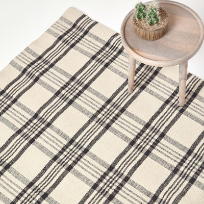 Homescapes Logan Black and White Tartan Check Non-Slip 100% Wool Rug, 120 x 170 cm