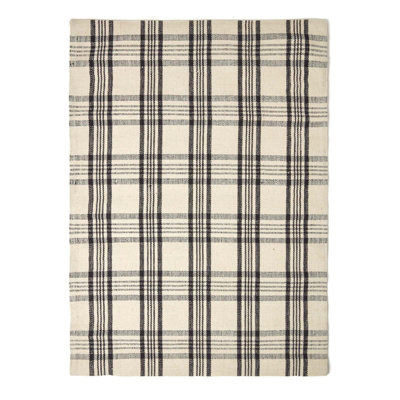 Homescapes Logan Black and White Tartan Check Non-Slip 100% Wool Rug, 120 x 170 cm