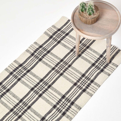 Homescapes Logan Black and White Tartan Check Non-Slip 100% Wool Rug, 66 x 200 cm