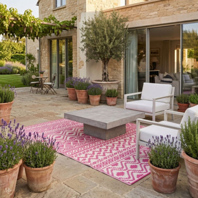 Homescapes Luxury Tia Aztec Pink & White Reversible Waterproof Outdoor ...