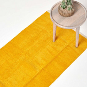 Homescapes Mustard 100% Cotton Plain Chenille Rug with Natural Trim, 66 x 200 cm