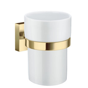 House - Holder in Polished Brass with Porcelain Tumbler.