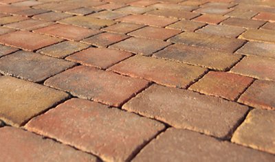 Paving blocks with gaps in between them which will allow water to drain.
