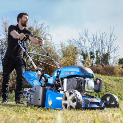 Electric start lawn mower deals with roller