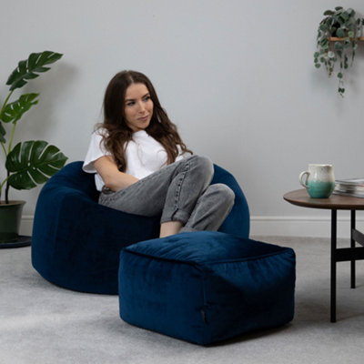 Blue velvet bean bag shop chair