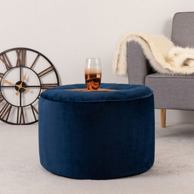 Navy blue store velvet pouffe