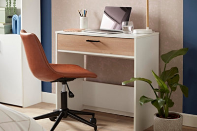 White and brown wooden desk with a tan leather effect swivel chair.