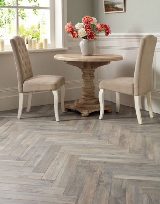 Impero Herringbone Beach House Oak 12mm Laminate Flooring. Pack | DIY at